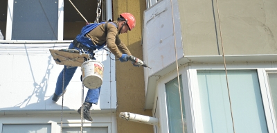 Утеплення балкону промисловими альпіністами